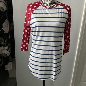 White and blue striped shirt with quarter cut red sleeves with white stars.